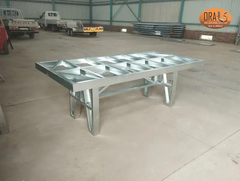 Custom office table frame using ORALS-supplied structural systems and materials