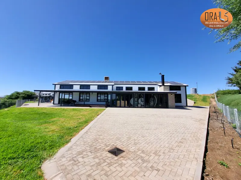Residential house completed using ORALS-supplied structural systems and materials