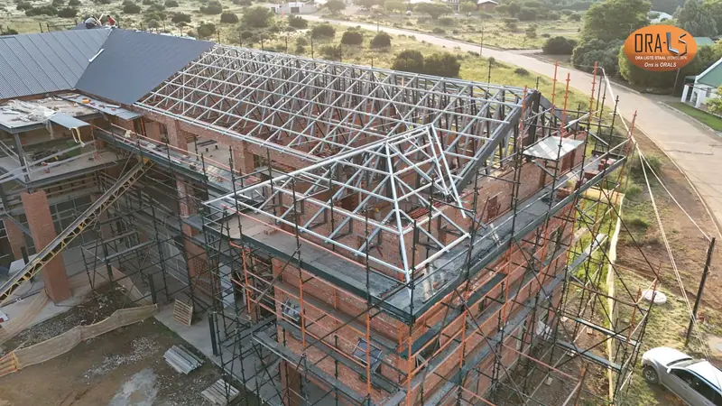 Commercial building roof using ORALS-supplied structural systems and materials