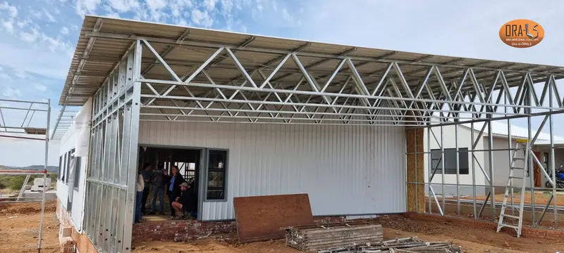 Residential house extension canopy using ORALS-supplied structural systems and materials