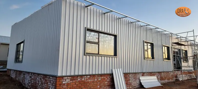 Residential house external cladding using ORALS-supplied structural systems and materials
