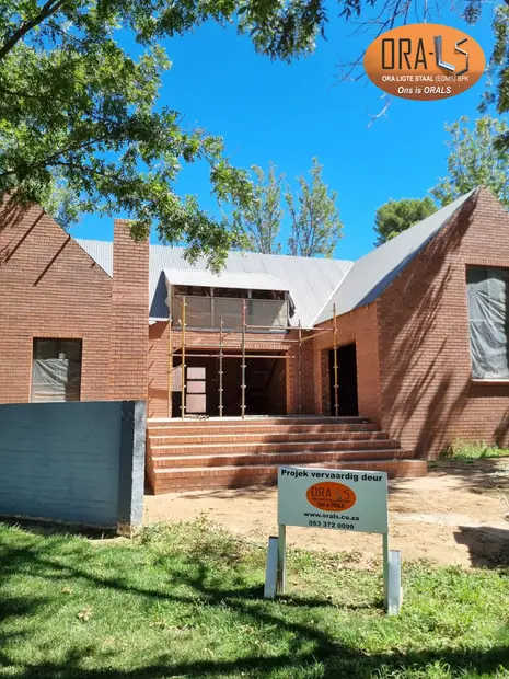 Residential house roof structure using ORALS-supplied structural systems and materials